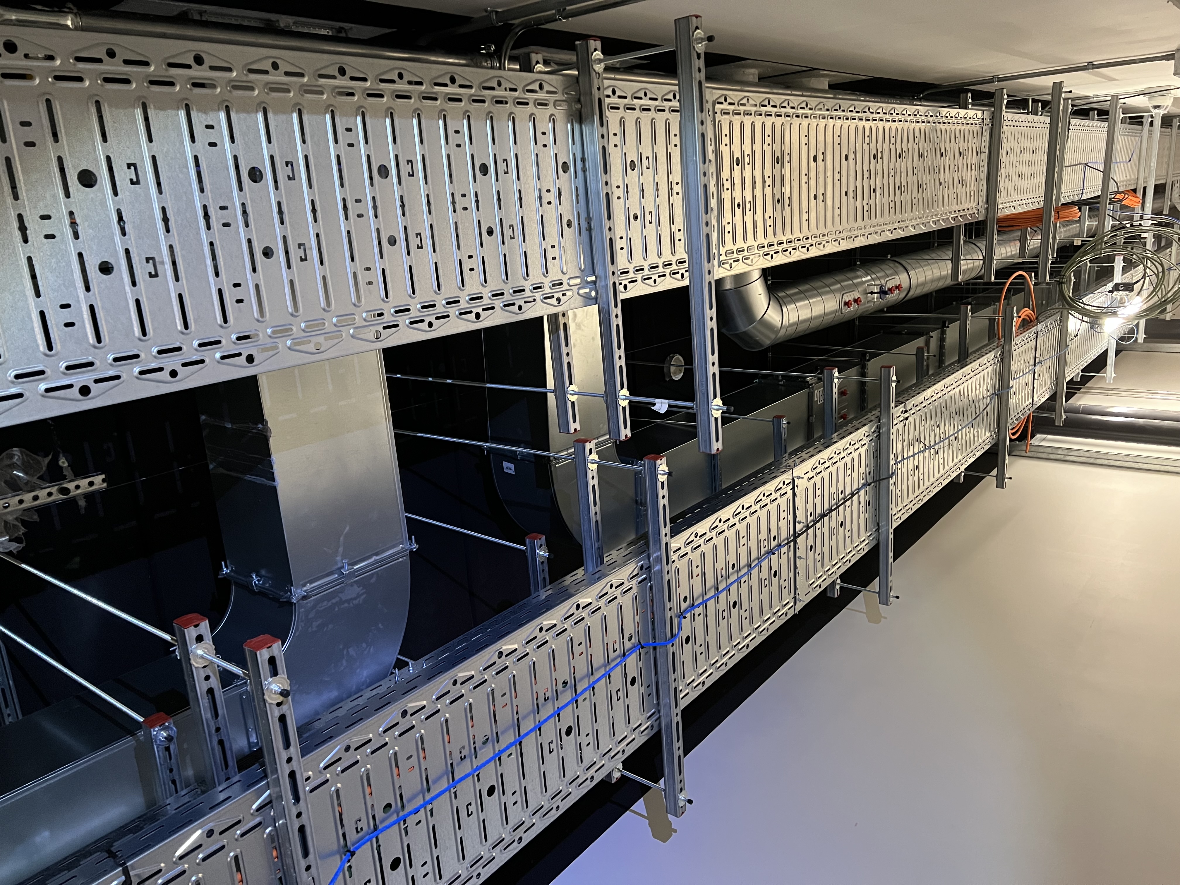 Cabling and cable trays installation works in datacenters - Industrycore. 