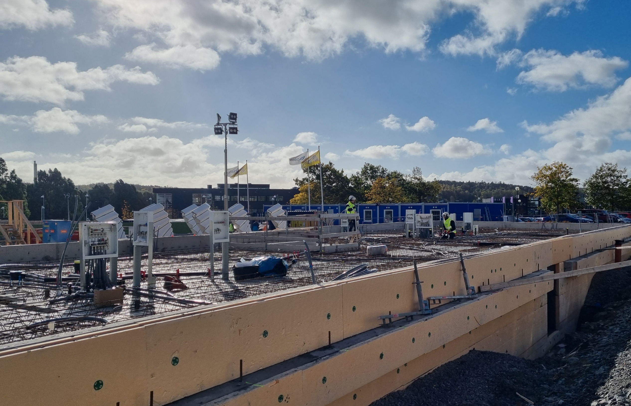 Concrete and rebar works on building construction - Industrycore. 